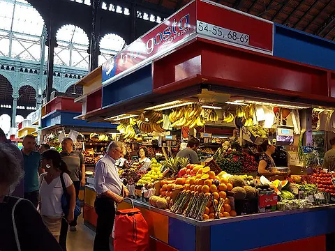 Local produce stalls inside Málaga’s historic Atarazanas Market during a private food tour.