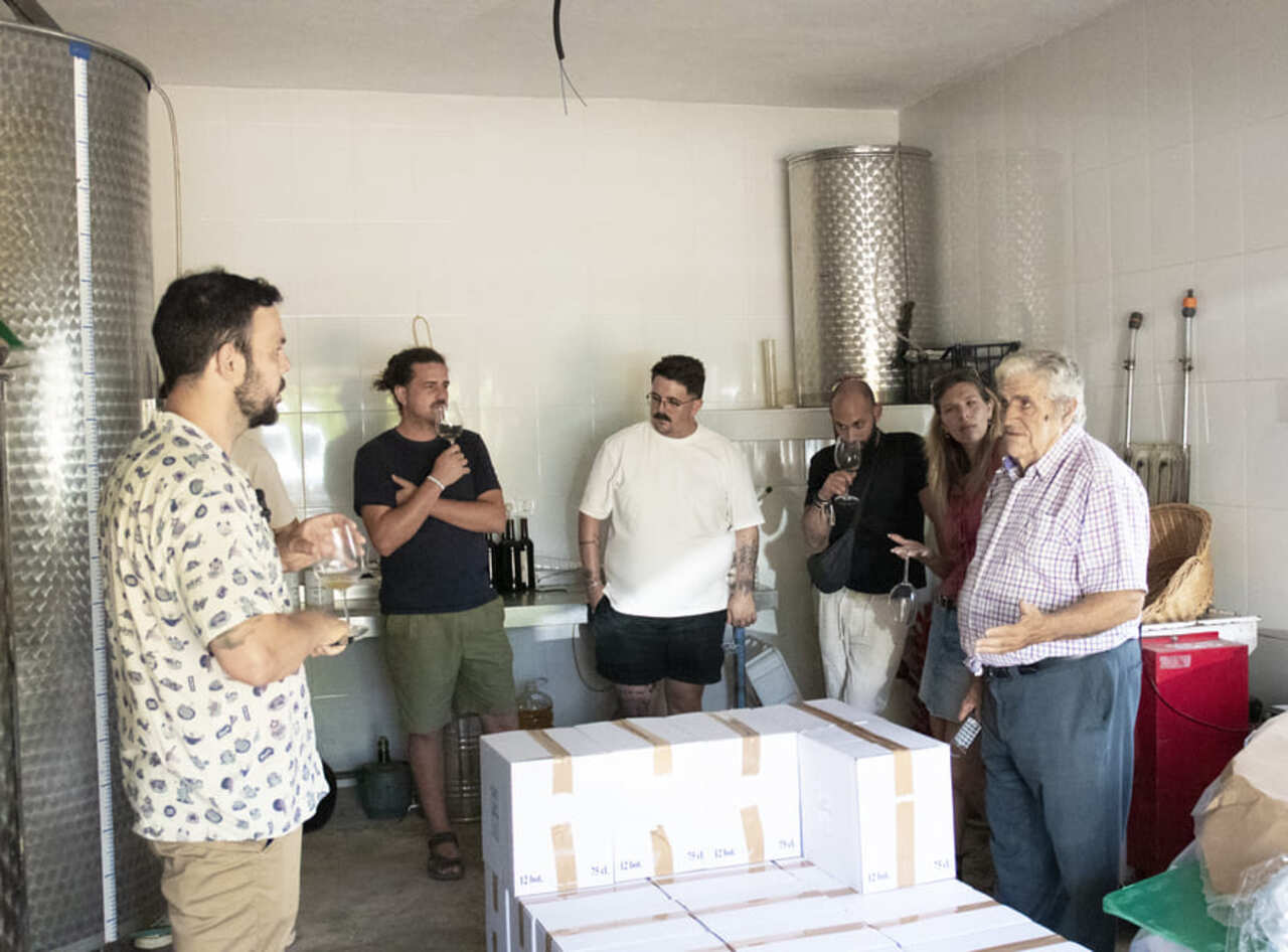 Group visiting an artisan natural wine winery in Málaga