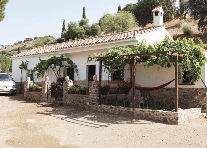 Traditional rural winery house surrounded by vineyards in Málaga
